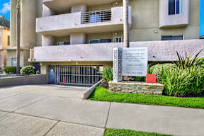 A sign in front of a building that says "The Second Floor".