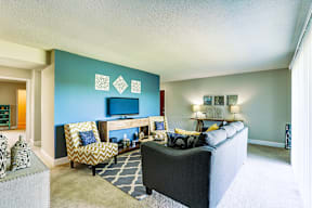 Living room in a Signature series 2-bed, 2-bath apartment at Somerset Lakes, offering a spacious layout.