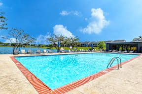 Swimming pool at Somerset Lakes Apartments, offering a relaxing outdoor space.