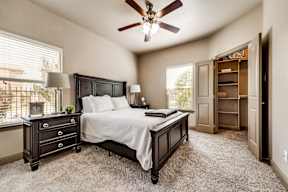 Spacious apartment bedroom with natural light at Timber Creek Apartments