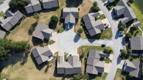 an aerial view of houses in a suburban neighborhood