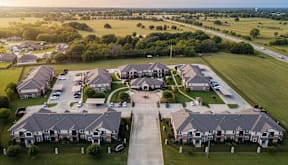 Aerial view of Timber Creek Apartments and surrounding community in Sulphur Springs, TX