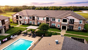 Swimming pool and spa at Timber Creek Apartments in Sulphur Springs, TX