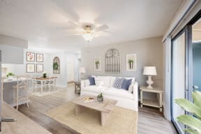 a living room with a white couch and a coffee table at Lakeside Gardens, Florida