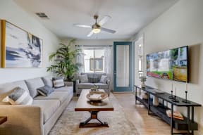 a living room with a couch and a coffee table