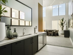 a kitchen with a sink and a large window
