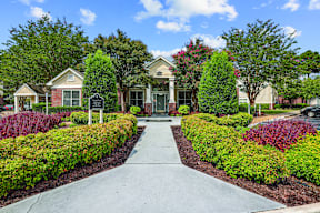 A residential area with a pathway and houses.