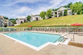Relaxing Pool Area With Sundeck