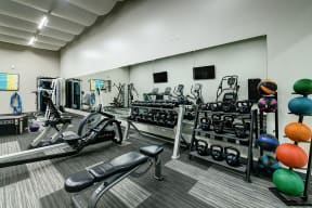 Axis at Westmont fitness center with weight equipment and cardio machines