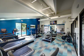 The Bennington Apartment's fitness center with exercise equipment