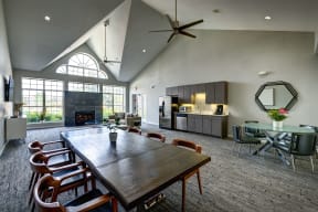 Axis at Westmont community room with a dining table and seating area