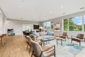 spacious seating area in the resident lounge room at Eagle Creek Apartments