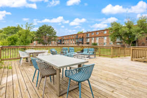 dining tables on a large wood deck
