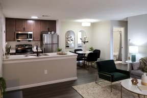 dining area next to an open-concept kitchen