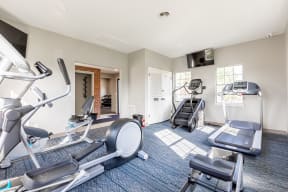 cardio machines in the fitness center at Littlestone Apartments in Gallatin