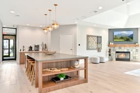 large island in the newly renovated resident clubhouse at Farmington Lakes Apartments