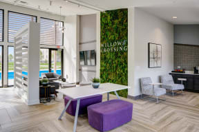 Willow Crossing apartment community lobby with a white desk