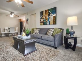 spacious apartment with a furnished living and dining area
