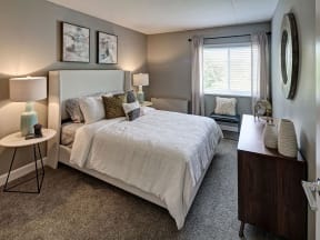 beautifully furnished bedroom of a Willow Crossing apartment in Elk Grove Village