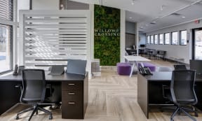 Willow Crossing Apartment's lobby and leasing center with desks