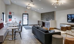 dining area, lounge area, and resident kitchen in the Willow Crossing Apartments clubhouse