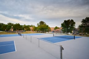 outdoor tennis courts at Valley Creek Apartments in Woodbury, MN