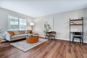 a living room with a couch and a coffee table