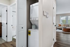 a laundry room with a washer and dryer in it