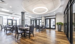 a large room with tables and chairs
