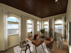 A room with a desk, chairs, and a television.