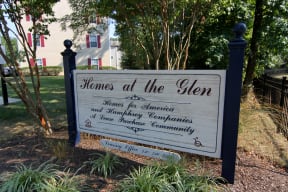 Home at the Glen sign in front of community