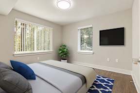 A bedroom with a bed, a plant, and a television.