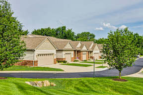 A residential area with houses and trees.
