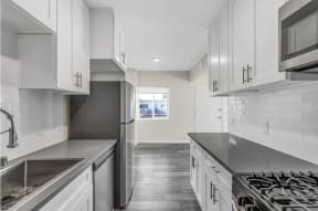 Kitchen at Courtyard La Pat Apartments in Westminster California