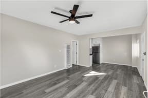 Living room at Courtyard La Pat Apartments in Westminster California