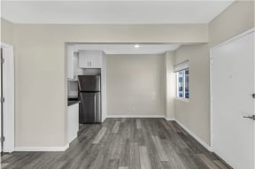 Living room at Courtyard La Pat Apartments in Westminster California