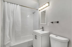 bathroom at Courtyard La Pat Apartments in Westminster California
