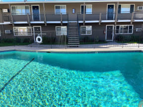 Towne Centre at Orange Apartments with swimming pool.