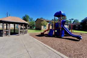 playground at the whispering winds apartments in pearland, tx
