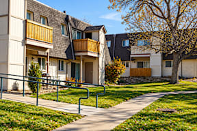 Apartment buildings with a walkway in front t Mountain Terrace Apartments , Westminster, CO, 80031