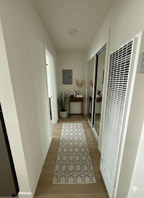 Laura Apartments Studio Hallway