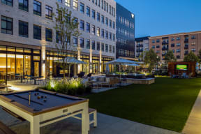 Courtyard game table and outdoor movie theater