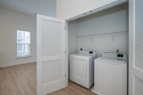 A laundry room with a washer and dryer.