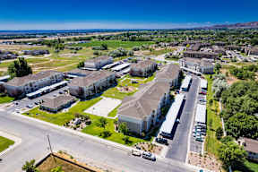 A large, well-maintained apartment complex with multiple buildings and green spaces.