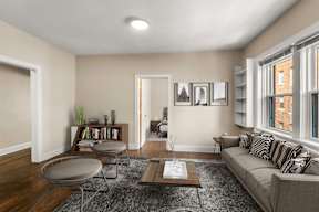 a living room with a couch and a coffee table