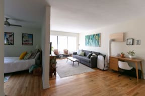 a living room with a couch and a table