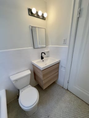 a small bathroom with a toilet and a sink