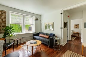 a living room with a couch and a table
