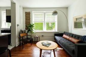 a living room with a couch and a table