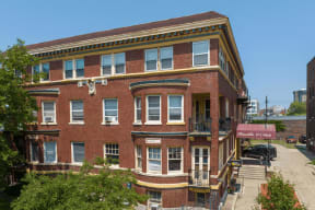 a red brick building on the corner of a street